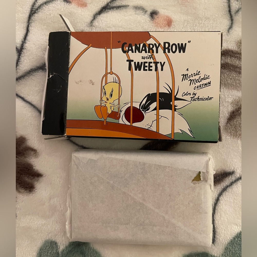 Business card holder. Tweety & Sylvester, "Canary Row" design.